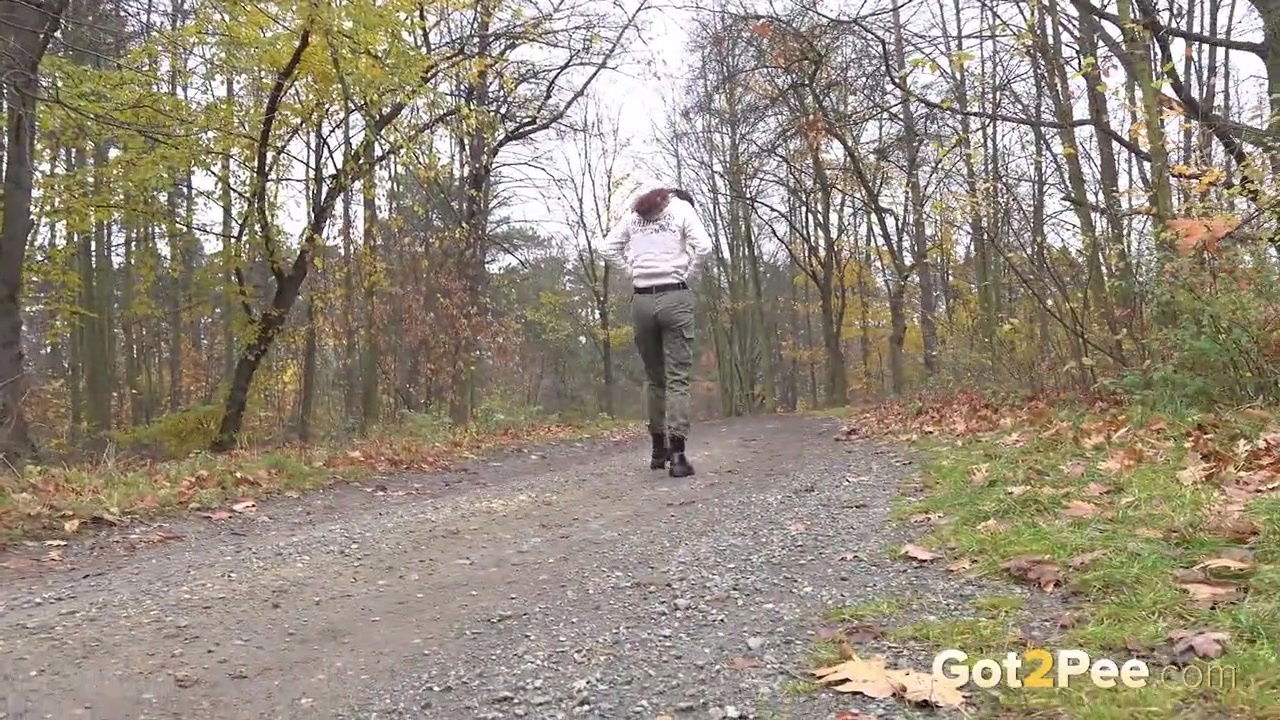 Ali Bordeaux squats and pees on a wooden bench